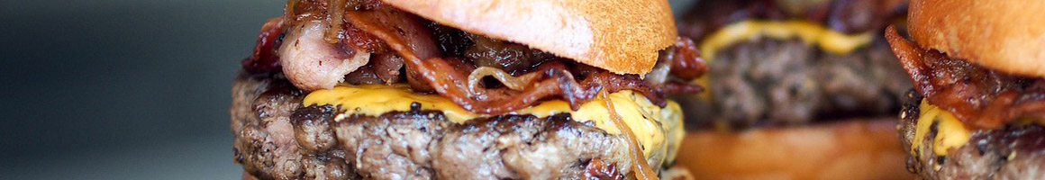 Eating Burger at Bubba's Texas Burger Shack restaurant in Houston, TX.